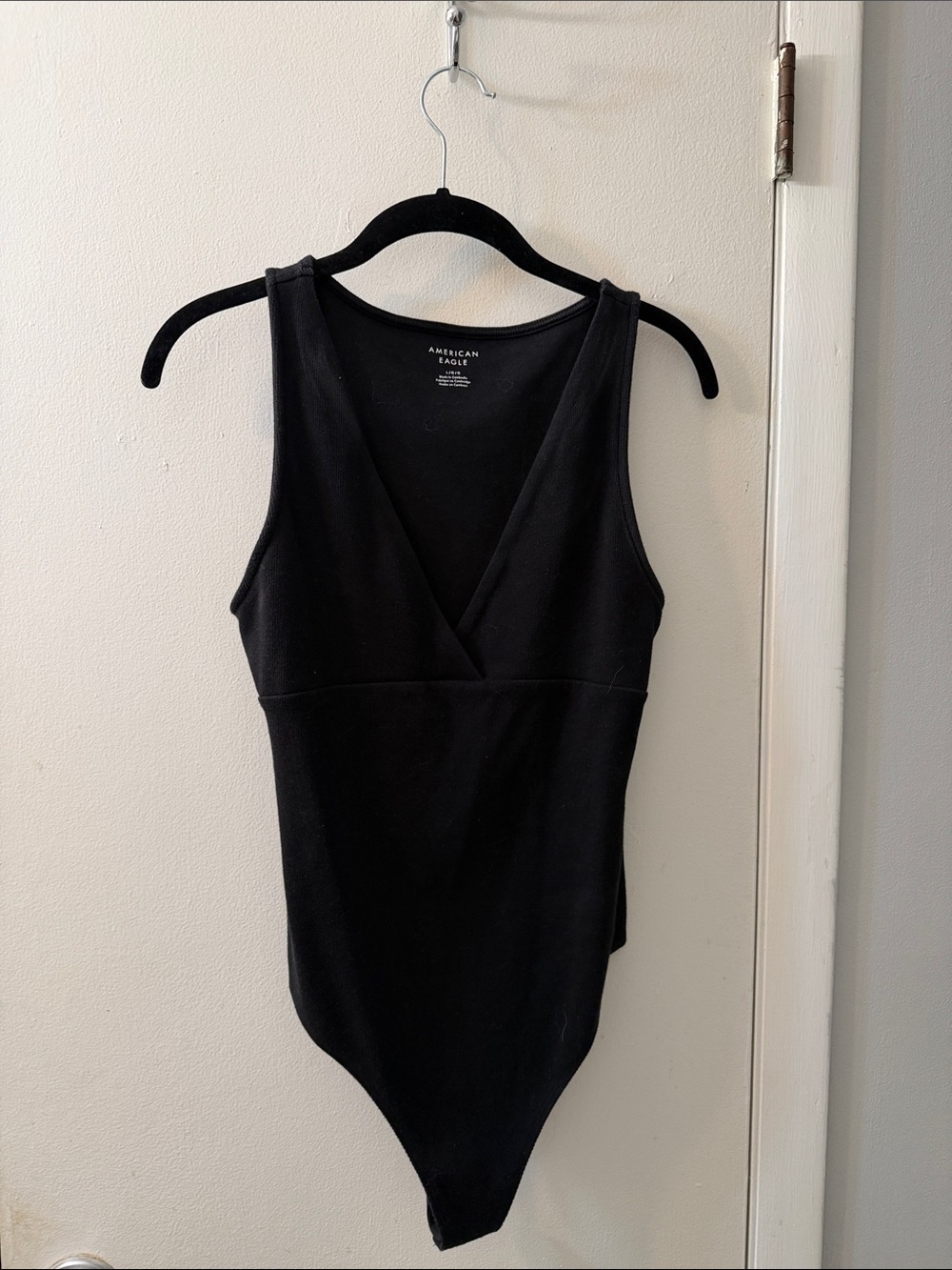 American Eagle Outfitters Black V-Neck Sleeveless Wrap Bodysuit